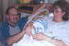 Michael Freeman (Hann) and Julia Kirk (AHS 84) with their newborn son, Seth.